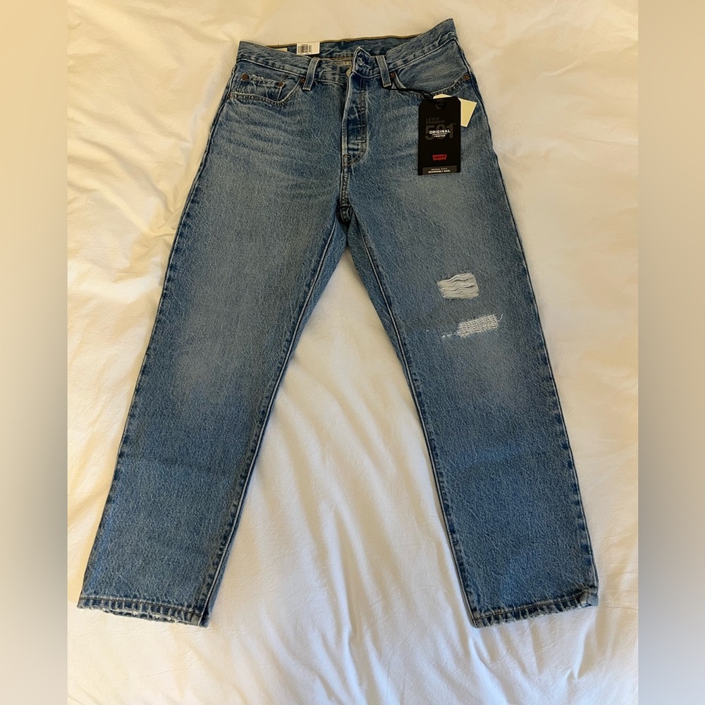 501 cropped, high waisted distressed Levi’s